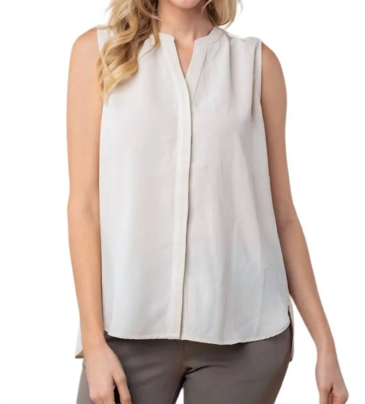 Sleeveless Solid Woven Top In Cream